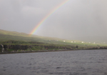 regenbogen über der ankerbucht